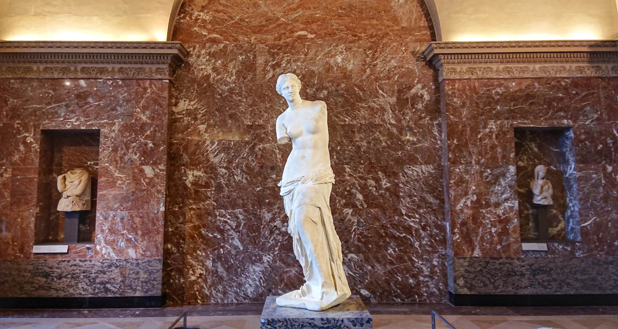 The Venus De Milo statue on display at The Louvre