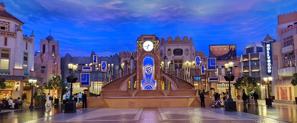 The central plaza hub of Warner Bros. World Abu Dhabi themed like classic Hollywood