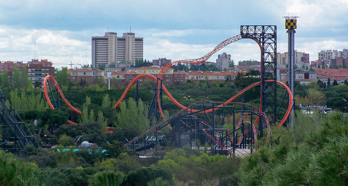View of the Royal Palace and Madrid city skyline visible from the rides at Parque de Atracciones