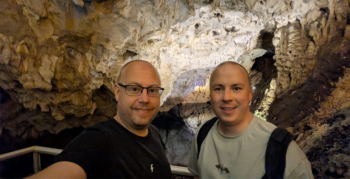 Stalactites and moody lighting inside Vrelo Cave at Matka Canyon