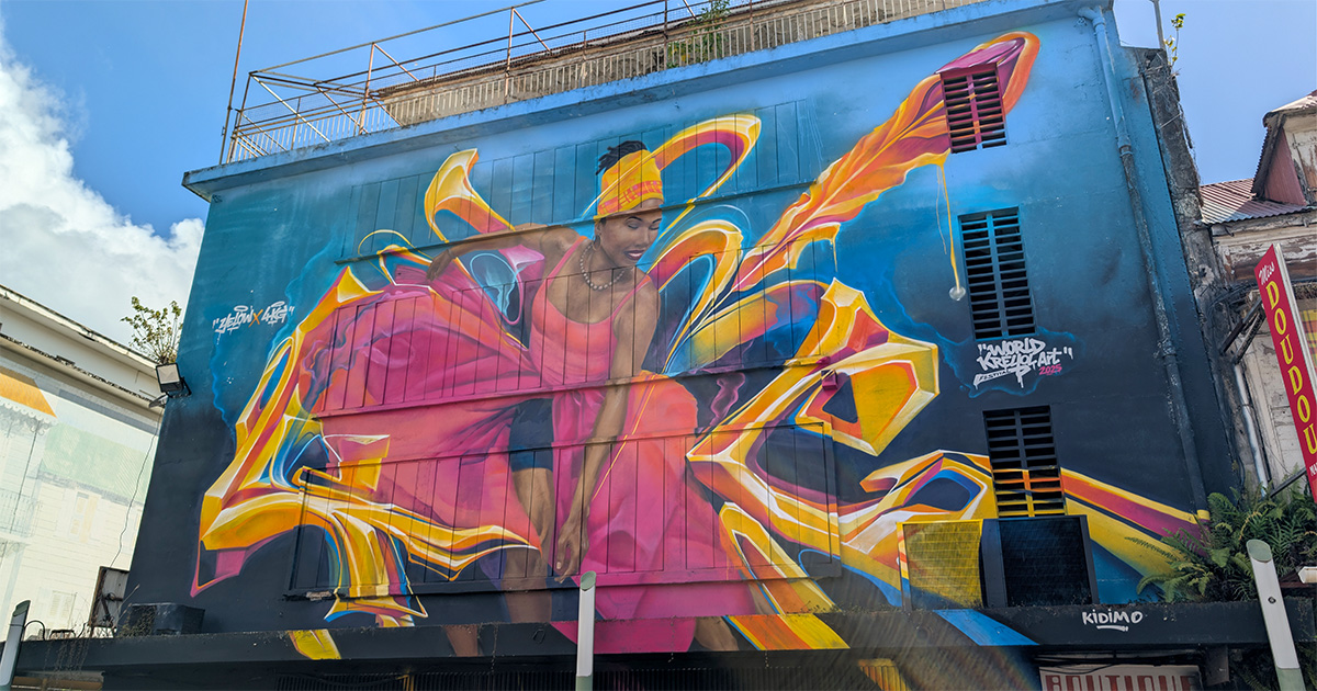 Colourful street art of a local doudou near the Pointe-à-Pitre cruise port