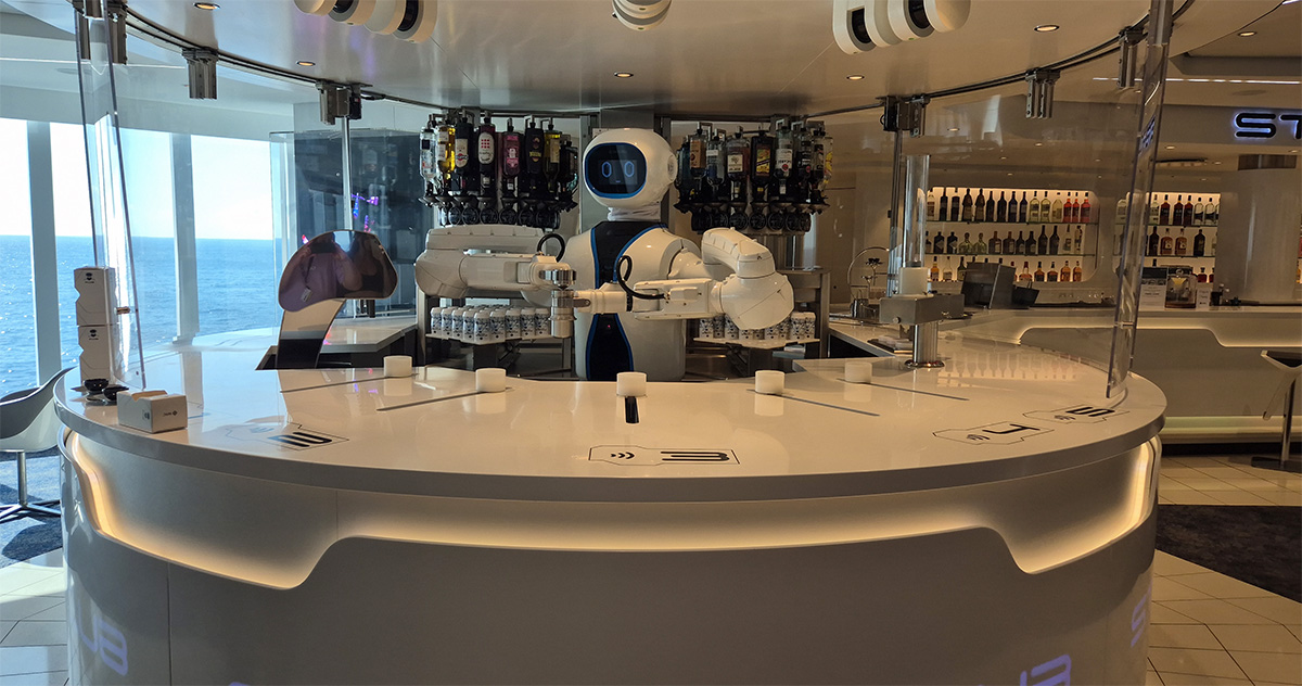 Rob the robotic bartender mixing drinks at the Starship Club