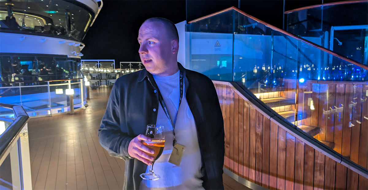 Denis enjoying a drink on the pool deck of the MSC Virtuosa cruise ship in the Caribbean